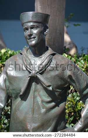 SAN DIEGO CA USA APRIL 8 2015: Detail of the bronze statues of A National Salute to Bob Hope and the Military. On the plaza, there are 15 bronze statues, arranged as if attending a Bob Hope show.
