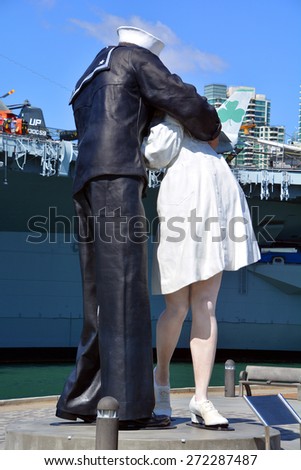 SAN DIEGO USA APRIL 8 2015: Unconditional Surrender sculpture at sea port in San Diego. By Seward Johnson, the statue resembles the photograph of Alfred Eisenstaedt of VJ day in Times Square New York