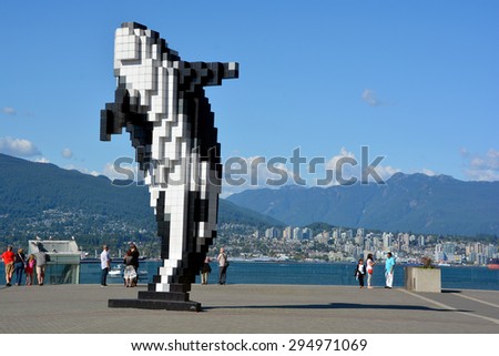 VANCOUVER BC CANADA JUNE 15 2105:  Digital Orca is a 2009 sculpture by Douglas Coupland, located adjacent to the Vancouver Convention Centre is commonly referred to as Lego Orca or Pixel Whale.[