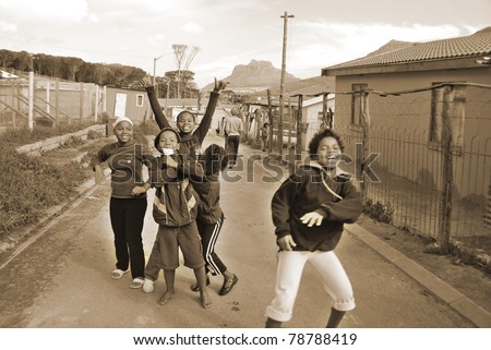 KHAYELITSHA, CAPE TOWN - MAY 22 : A unidentified group of young teenager dance on a street of Khayelitsha township, the name is Xhosa for New Home on May 22, 2007, Cape Town, South Africa