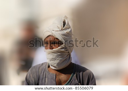 VALLEY OF THE KINGS,  EGYPT-NOV 22: Unidentified man work for excavation of tombs and buried treasure on November 22, 2009, Valley of the Kings, Egypt, often called the Valley of the Gates of the Kings