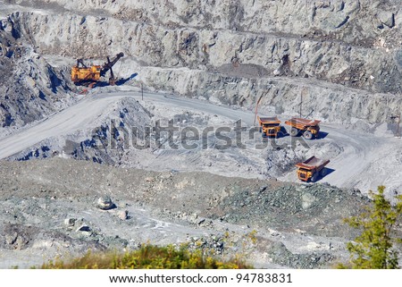 ASBESTOS - CANADA AUG. 23: Operation by workers in bottom of asbestos mine on Aug, 23 2010.The inhalation of asbestos fibers can cause serious illnesses, including malignant lung cancer.