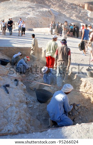 VALLEY OF THE KINGS, EGYPT- NOV 22: Unidentified men work for excavation of tombs and buried treasure on November 22, 2009, Valley of the Kings, Egypt,often called the Valley of the Gates of the Kings
