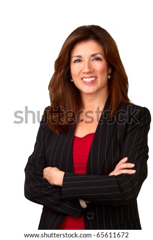 Portrait of a mature pretty businesswoman wearing red blouse and a black jacket.  Isolated on white background.  Arms are folded.