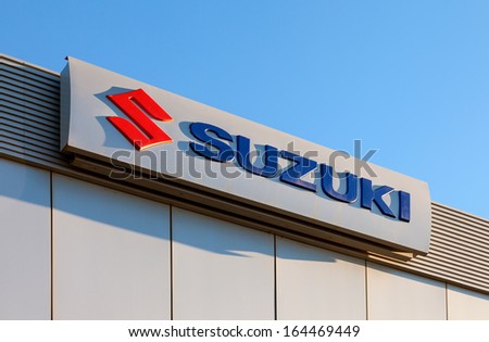 SAMARA, RUSSIA - NOVEMBER 24: The emblem Suzuki over blue sky, November 24, 2013 in Samara, Russia. Suzuki Motor Corporation is a Japanese multinational corporation