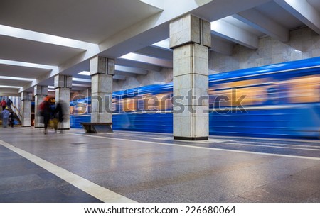 SAMARA, RUSSIA - OCTOBER 25, 2014: Blue train in motion at subway station Bezymyanka