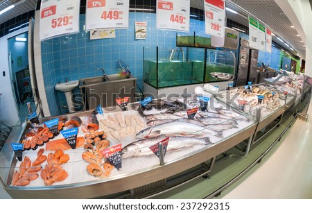SAMARA, RUSSIA - SEPTEMBER 28, 2014: Raw fish ready for sale in the hypermarket Karusel. One of largest food retailer in Russia
