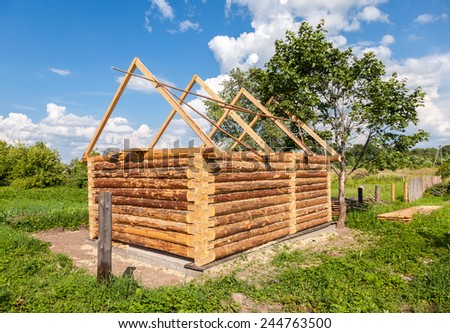 Construction of a new wooden bath house in Russian village