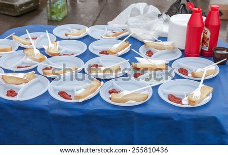 SAMARA, RUSSIA - FEBRUARY 22, 2015: Shrovetide in Russia. Disposable plates with bread and ketchup