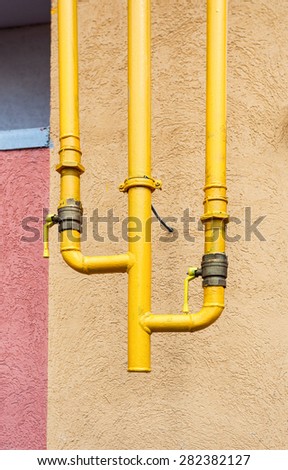 Gas valves on the pipe in an apartment house