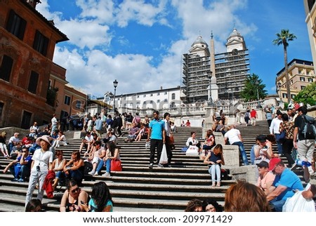ROME, ITALY - MAY 29: Tourists in Rome city visiting Spanish steps on May 29, 2014, Rome, Italy.