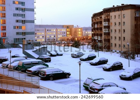 VILNIUS, LITHUANIA - DECEMBER 30: Vilnius city Pasilaiciai district new house and cars on December 30, 2014, Vilnius, Lithuania.