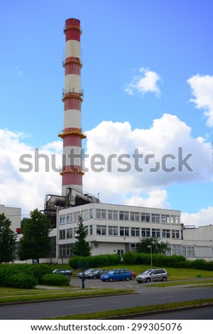 VILNIUS, LITHUANIA - JUNE 26: Chimney of energy producer in Vilnius city - Vilniaus Energija on June 26, 2015, Vilnius, Lithuania.