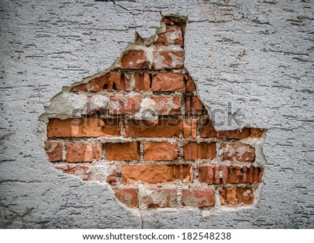 Conceptual Image Of A Rustic Wall With Hole In The Plaster