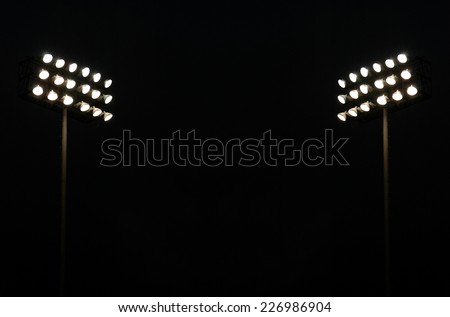 Twin Stadium Lights At A Sports Stadium At Night With Copy Space