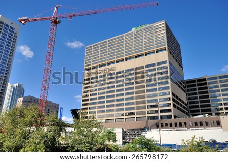 CHICAGO, USA - OCTOBER 6: Sun-times building and city constructions beside Chicago river in downtown of Chicago, Illinois, in October 6th, 2014.Chicago is the biggest city in North of USA.