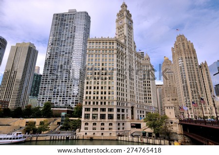 CHICAGO, USA - OCTOBER 6: Famous Wirgley and other city buildings beside Chicago river in downtown of Chicago, Illinois, in October 6th, 2014.Chicago is the biggest city in North of USA.