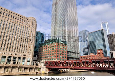 CHICAGO, USA - OCTOBER 6: City buildings and Chicago Merchandise Mart beside Chicago river in downtown of Chicago, Illinois, in October 6th, 2014.Chicago is the biggest city in North of USA.