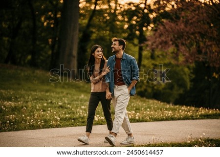 Similar – Image, Stock Photo Happy couple walking on sea