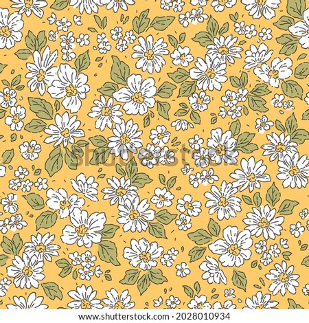 Vintage floral background. Floral pattern with small white flowers on a yellow mustard background. Seamless pattern for design and fashion prints. Ditsy style. Stock vector illustration.
