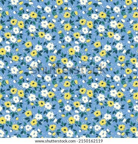 Cute floral pattern in the small flower. Seamless vector texture. Elegant template for fashion prints. Printing with small white and yellow flowers. Light blue background. Stock print.