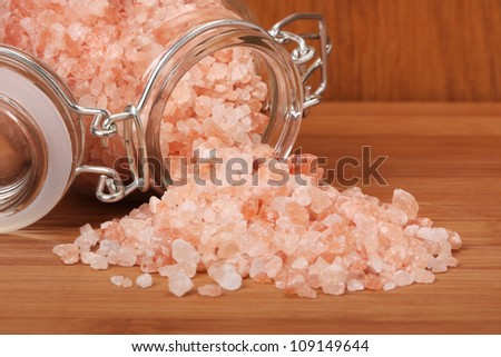 Himalayan pink salt in small jar of glass.