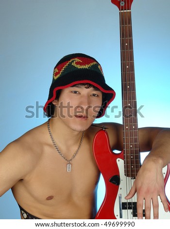 asian man with electro guitar