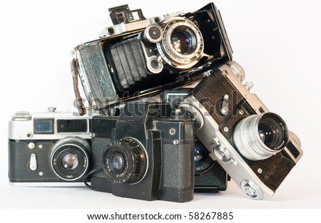OLD CAMERAS PYRAMID ON A WHITE