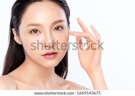 Beautiful Young Asian Woman with Clean Fresh Skin. Face care, Facial treatment, Cosmetology, beauty and healthy skin and cosmetic concept .woman beauty skin isolated on white background. 商業照片 © 
