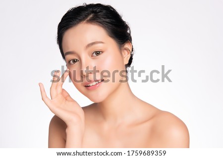 Beautiful Young asian Woman touching her clean face with fresh Healthy Skin, isolated on white background, Beauty Cosmetics and Facial treatment Concept, 商業照片 © 
