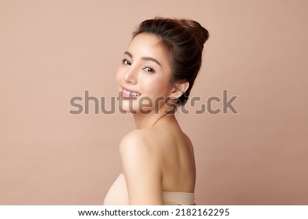 Similar – Image, Stock Photo Beautiful young Asian woman walking the street of historic European town with palm trees. Female tourist from China traveling in Europe, smiling. Exchange student.