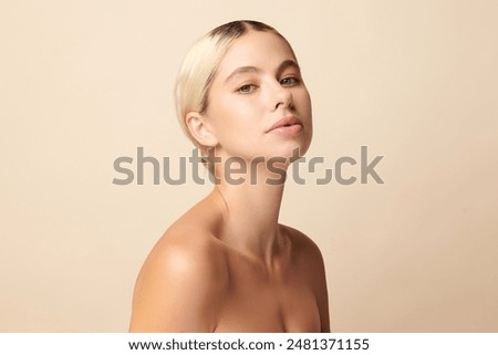 Similar – Image, Stock Photo woman with a face mask leaning against the wall using her smartphone