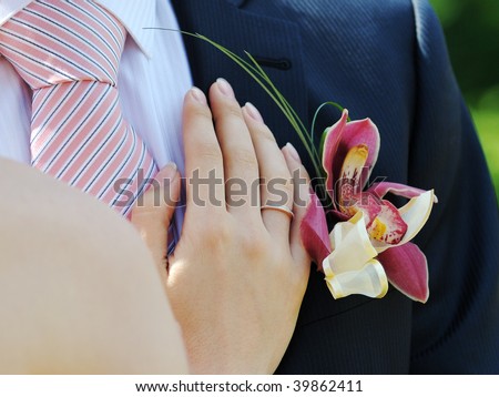 just married hands, groom, flowers