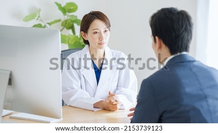 Asian doctors working at the hospital ストックフォト © 