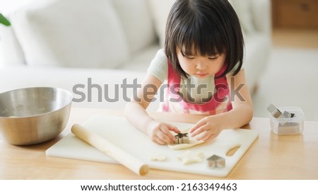 Similar – Image, Stock Photo Child making cookies at home