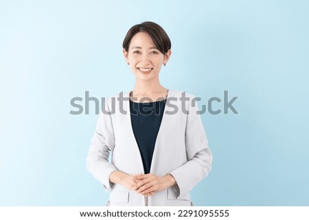 Similar – Image, Stock Photo Woman in light blue corduroy dress holds light blue bowl with mini eggplants in hand