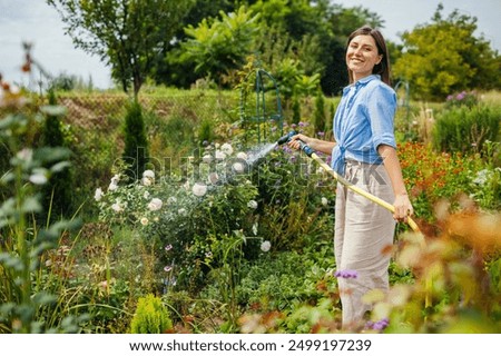 Similar – Image, Stock Photo Woman with water hose