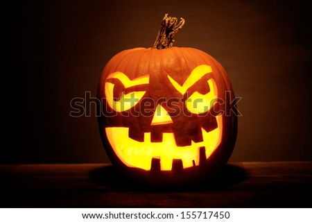 Halloween pumpkin head jack lantern with scary evil faces spooky holiday