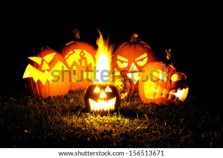 Halloween pumpkin head jack lantern with scary evil faces spooky holiday