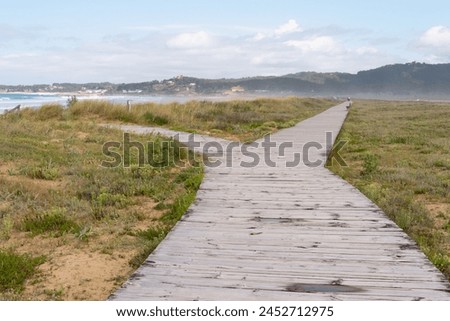 Similar – Foto Bild Holzweg zum Meer auf Sylt an einem Regentag