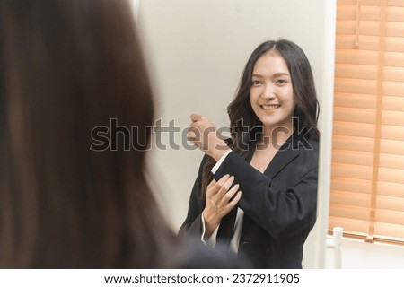 Image, Stock Photo Young woman in dressing room of swimming pool