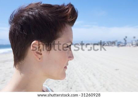 Profile of Beautiful Girl with cool hair cut