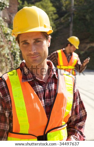 A Construction Worker on the job with a hard hat