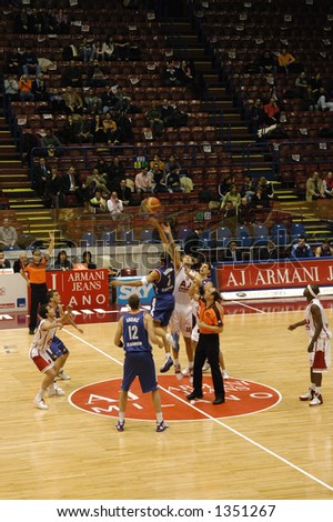 Tip-off at a basketball game in Milan, Italy