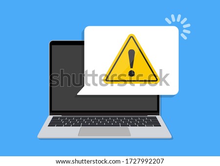 Laptop with warning notification speech bubble in a flat design