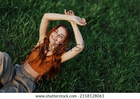 Similar – Image, Stock Photo Woman walking in green meadow near lighthouse