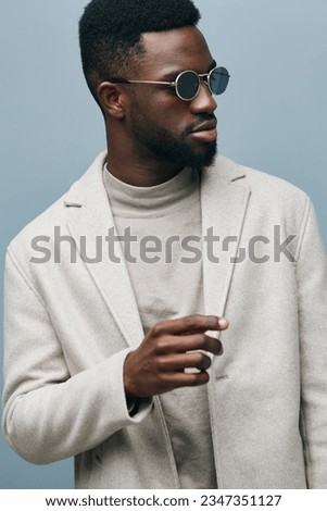 Similar – Image, Stock Photo Young stylish handsome man in suit with suitcase standing on metro station holding smart phone in hand, scrolling and texting, smiling and laughing.  Train passing by