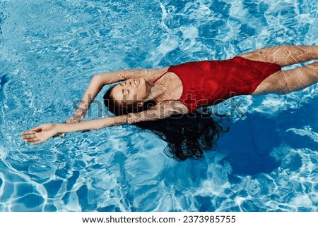 Similar – Image, Stock Photo Caucasian lady floating in turquoise sea.