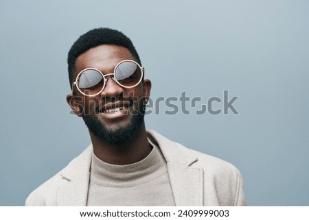 Image, Stock Photo Black man in trendy outfit near bicycle in city