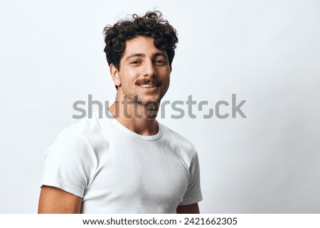 Similar – Image, Stock Photo Smiling curly haired man listening to music in headphones